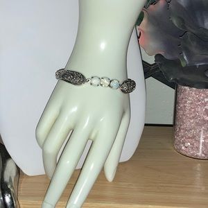 3 Moonstone Centered Silver Scrolled Bangle with Magnetic Closure